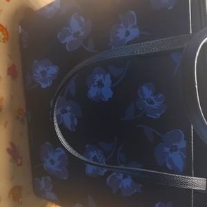 A beautiful black floral large Kate spade purse never used